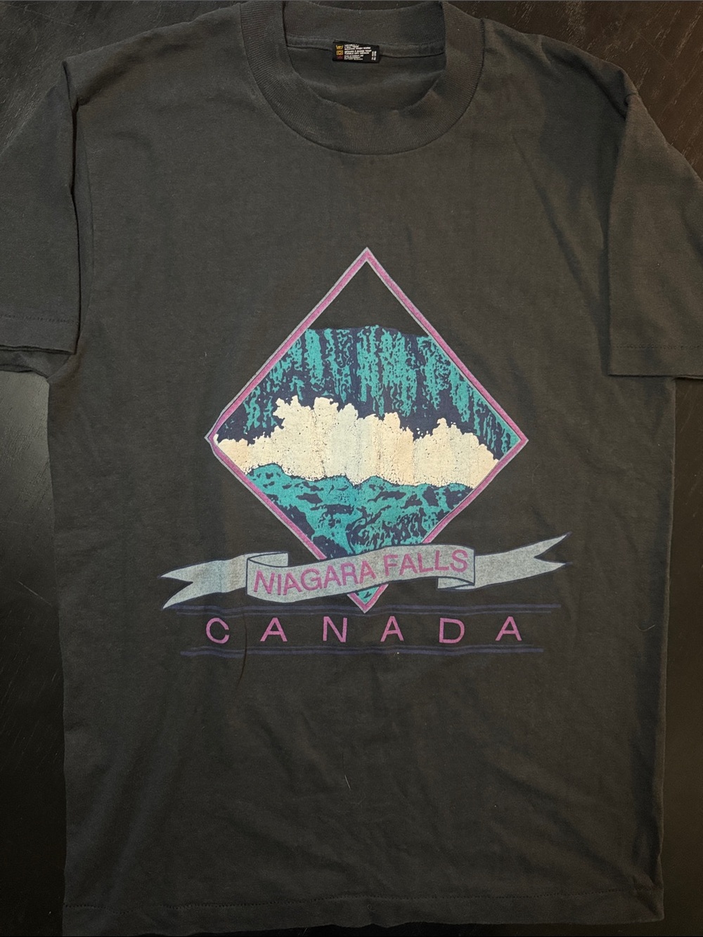 Vintage single stitch Niagara Falls Canada Graphic Tee — Black with Teal & Pink